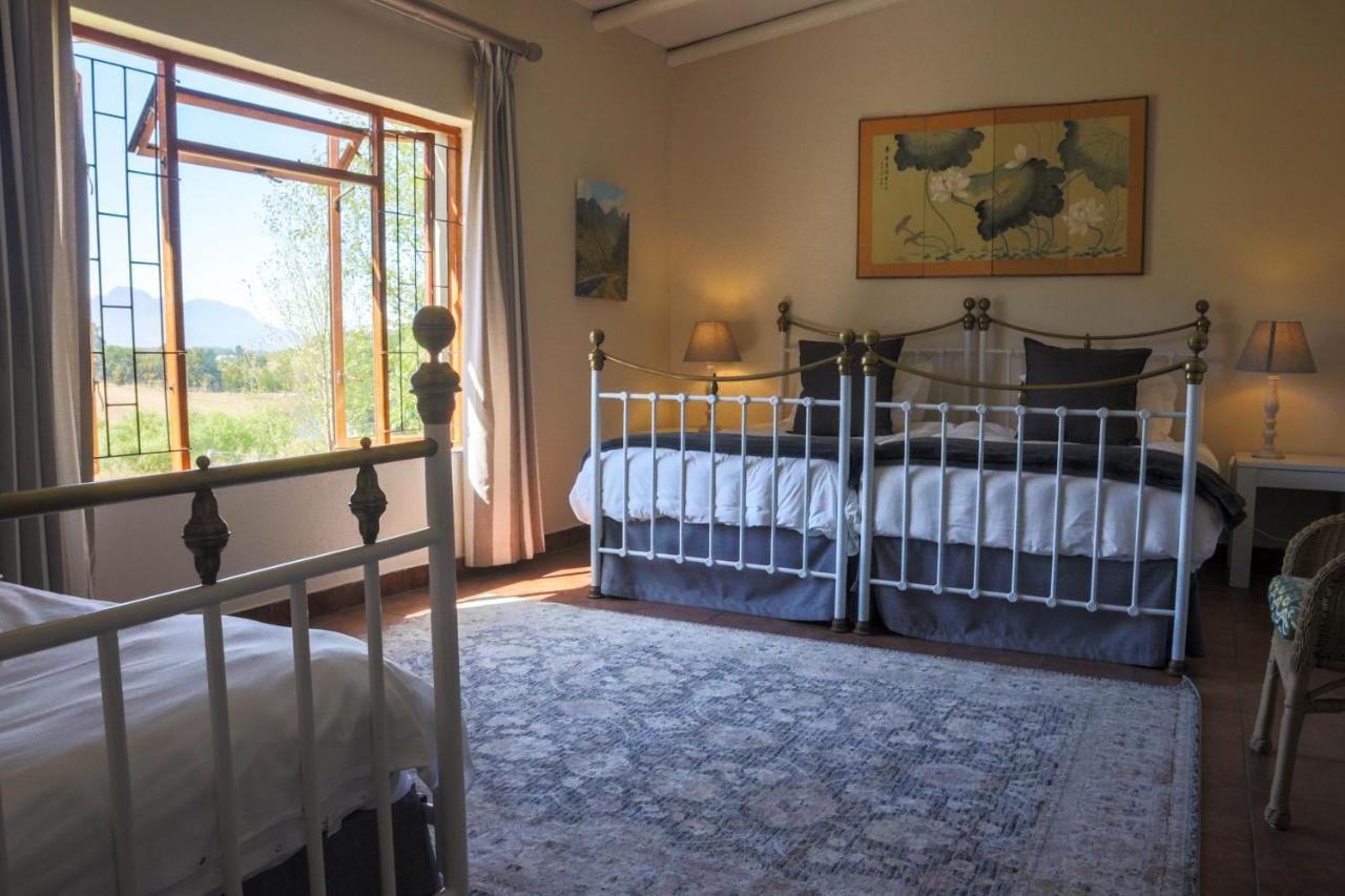 Zebra Cottage And Lodge สเตลเลนบอช ภายนอก รูปภาพ